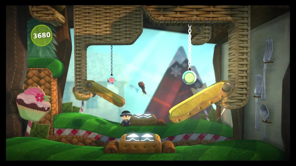 LittleBigPlanet 3 gameplay, Sackboy superando un nivel de plataformas