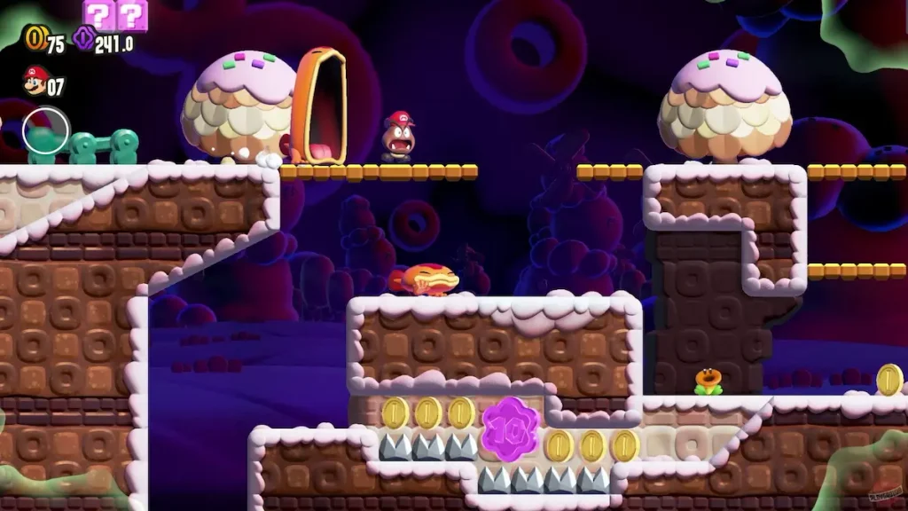 Super Mario Bros. Wonder gameplay, Mario avanzando por uno de los niveles de plataformas